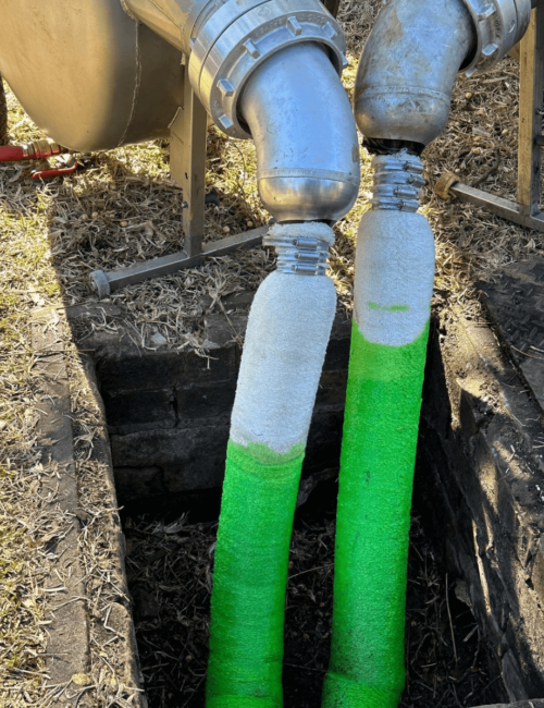 Green pipes in ground